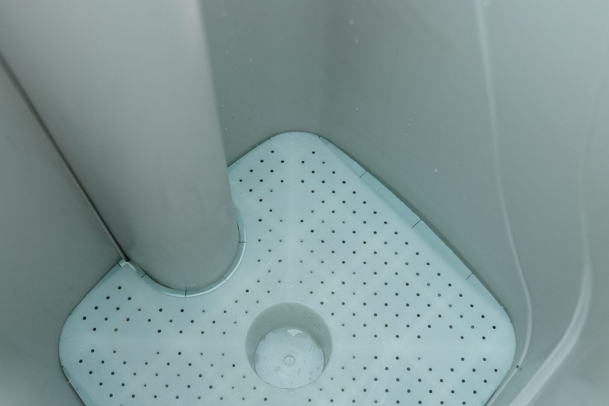 A brine tank left clean after a filter and salt service visit