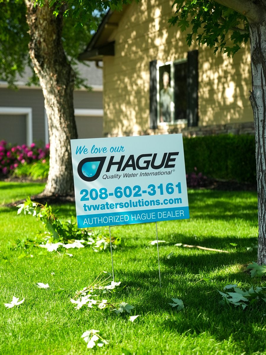 An authorized Hague dealer yard sign outside a Treasure Valley home